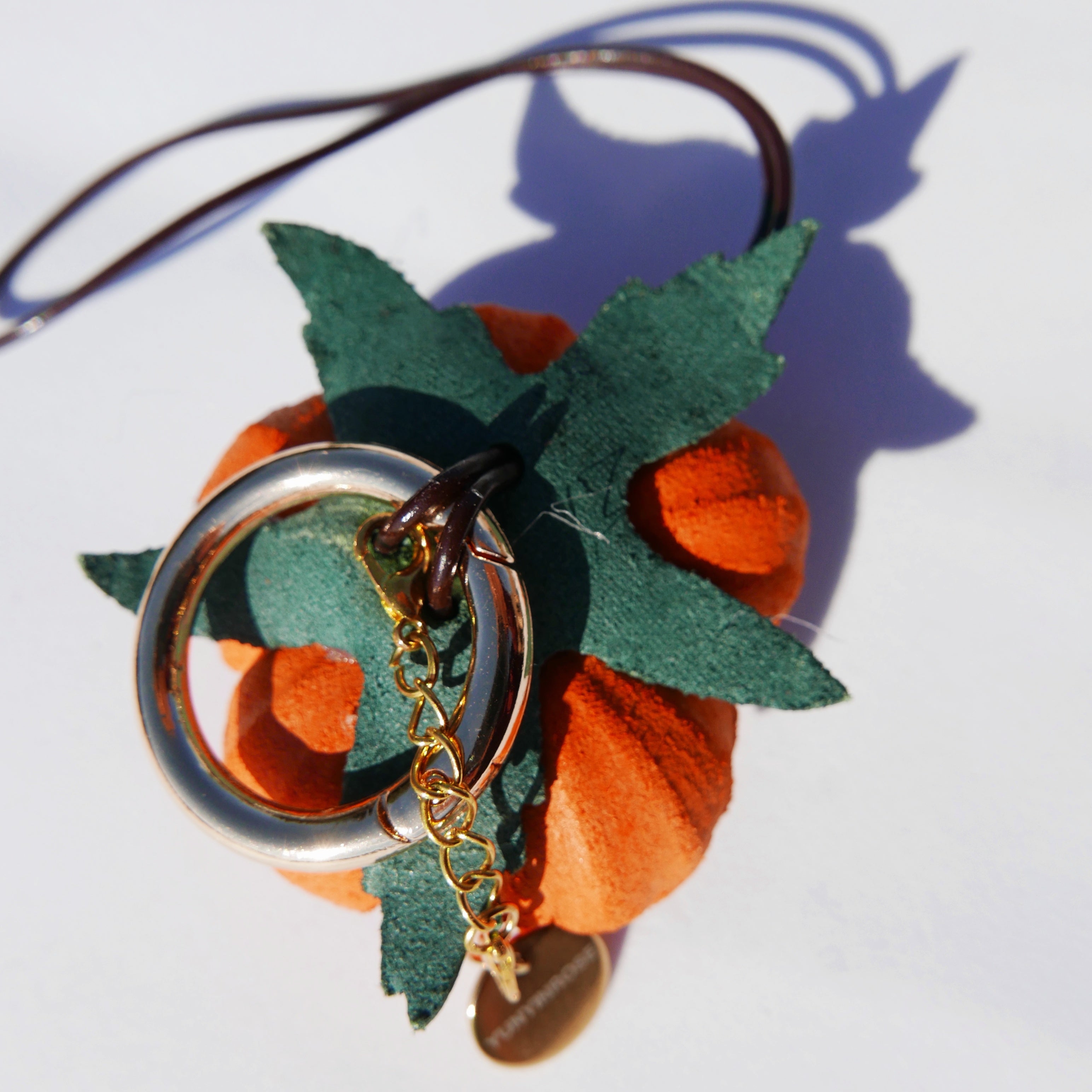 Charm de piel flor Mudan naranja