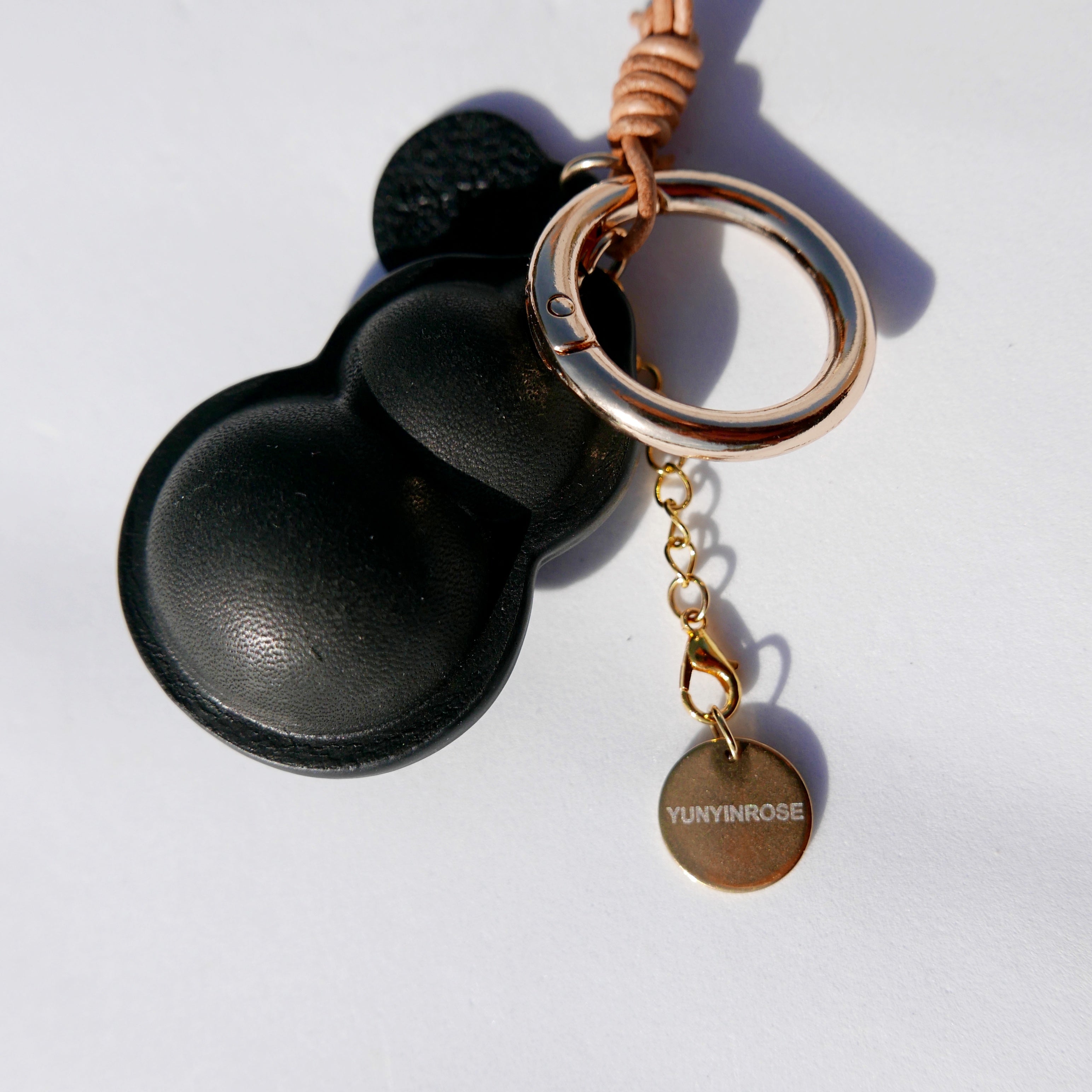 Charm de piel Hulu negro (calabaza china)