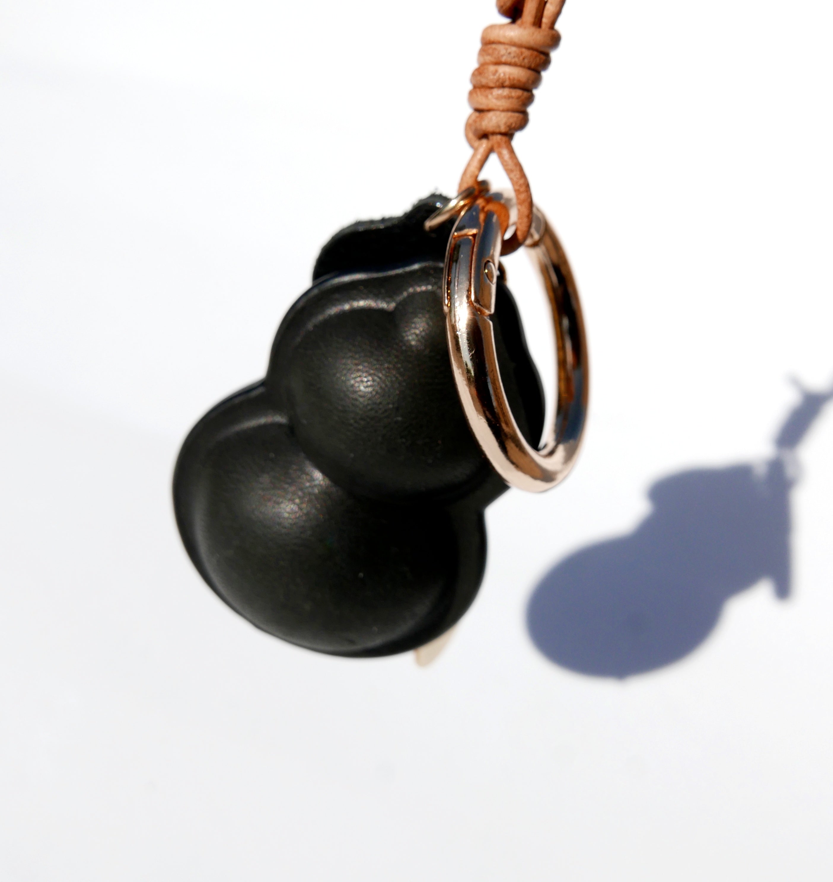 Charm de piel Hulu negro (calabaza china)