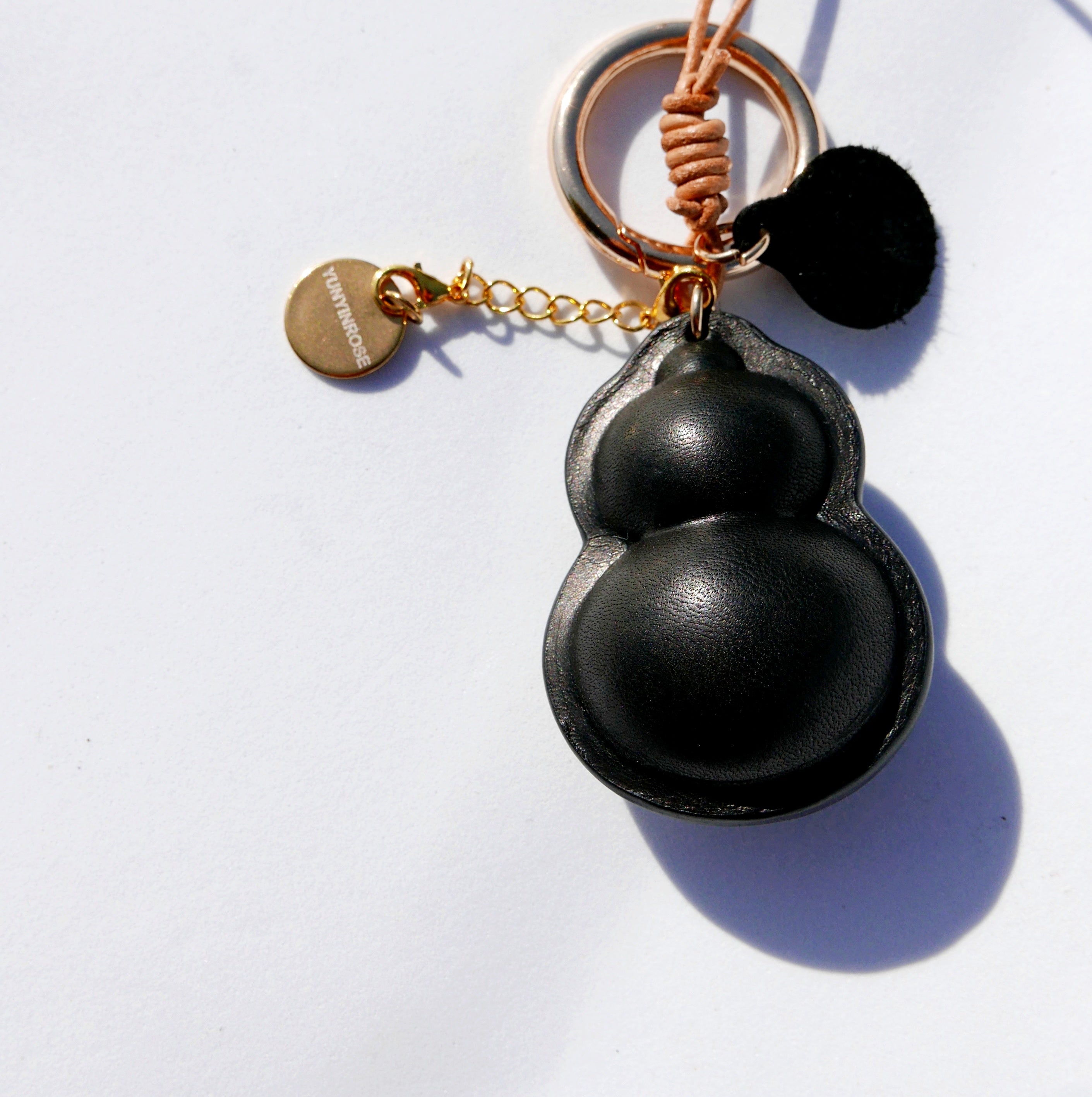 Charm de piel Hulu negro (calabaza china)