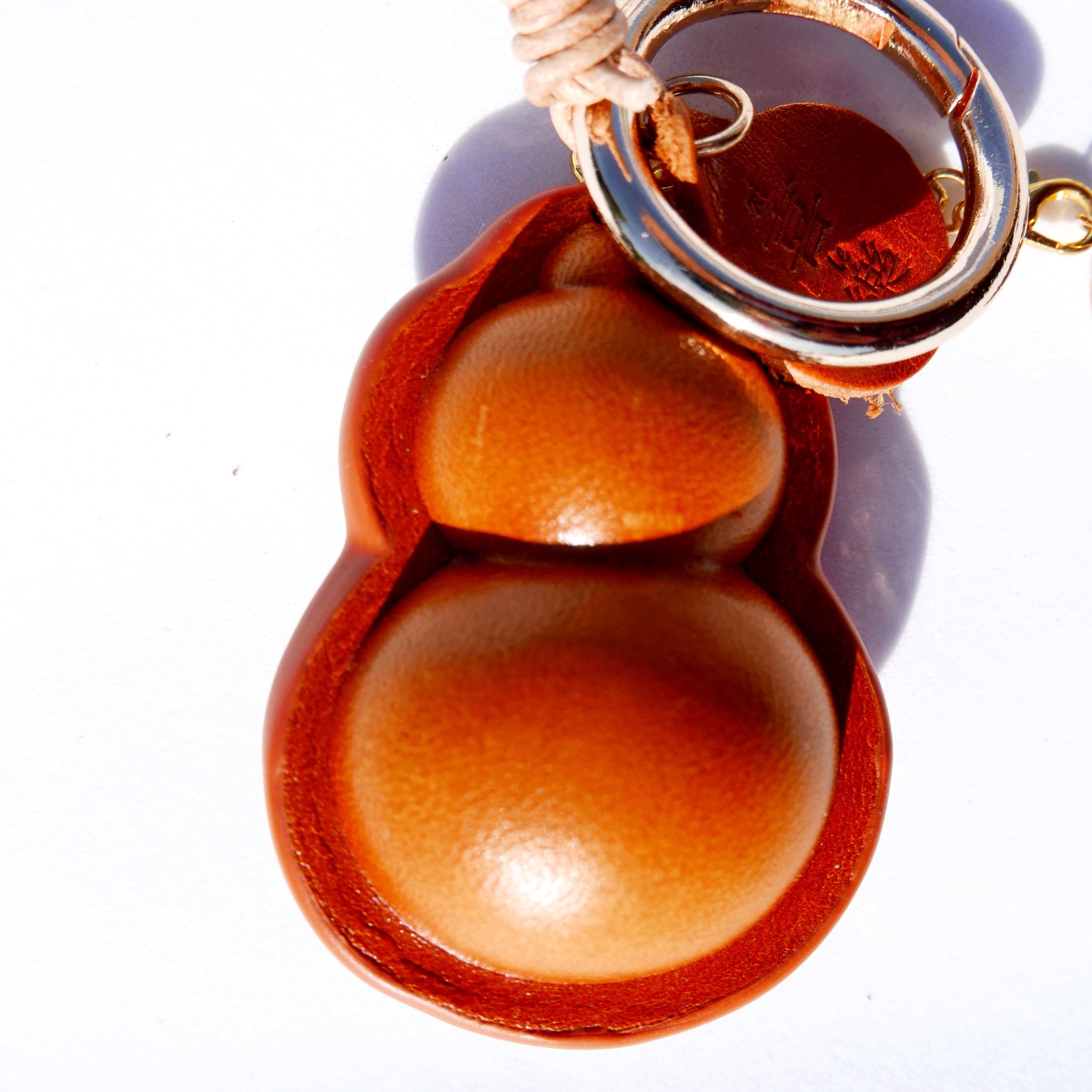 Charm de piel Hulu caramelo (calabaza china)