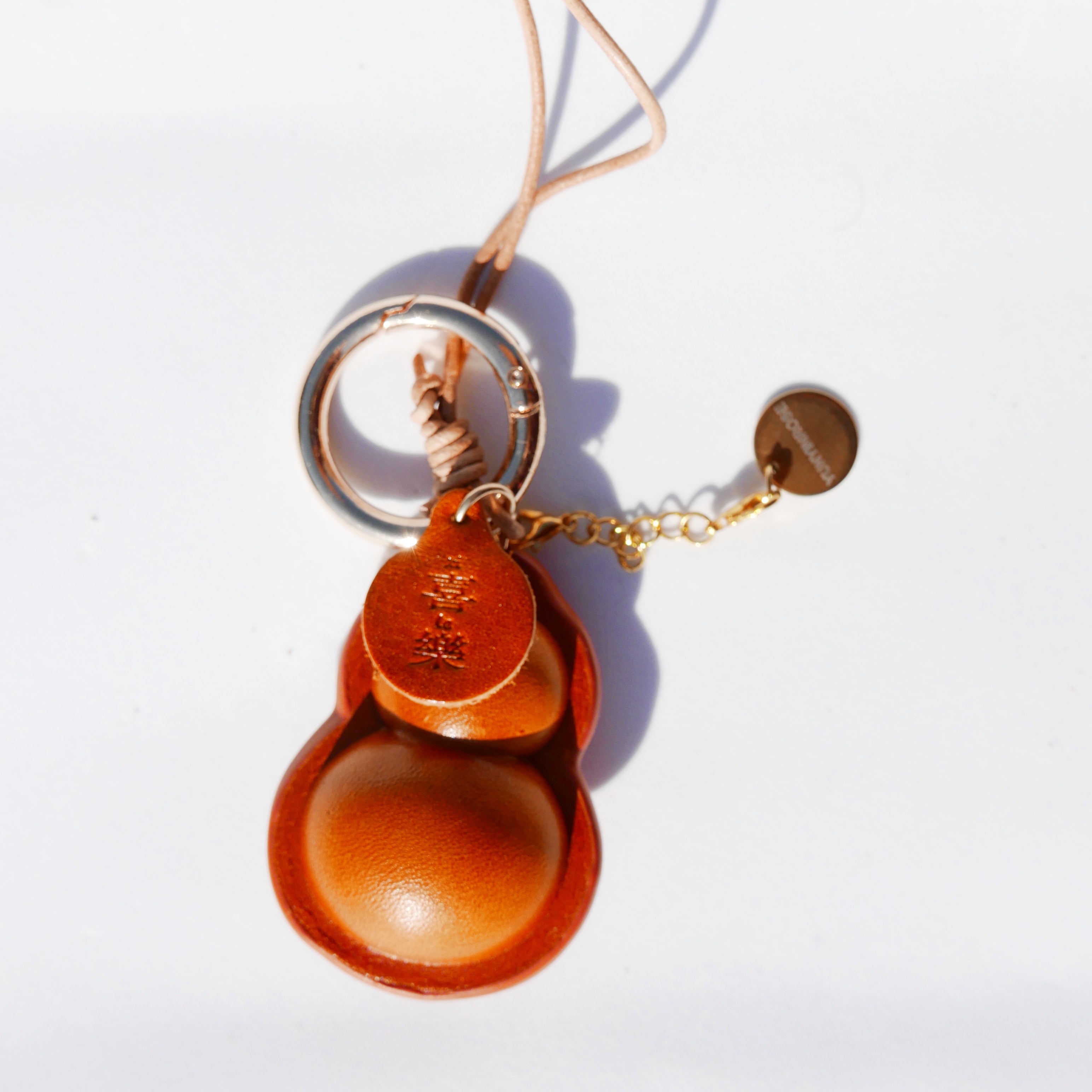 Charm de piel Hulu caramelo (calabaza china)