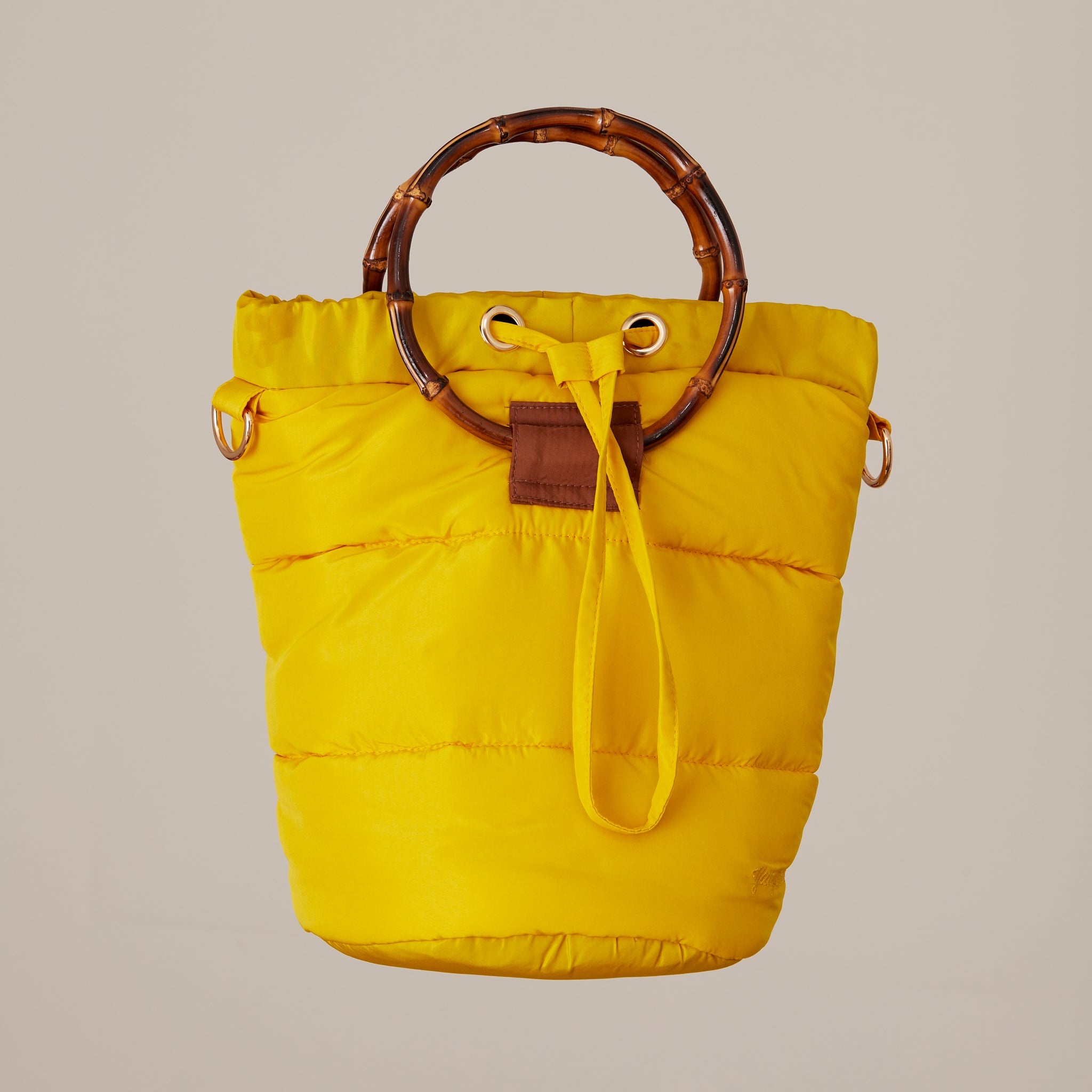 Nara bolso bombonera acolchado amarillo