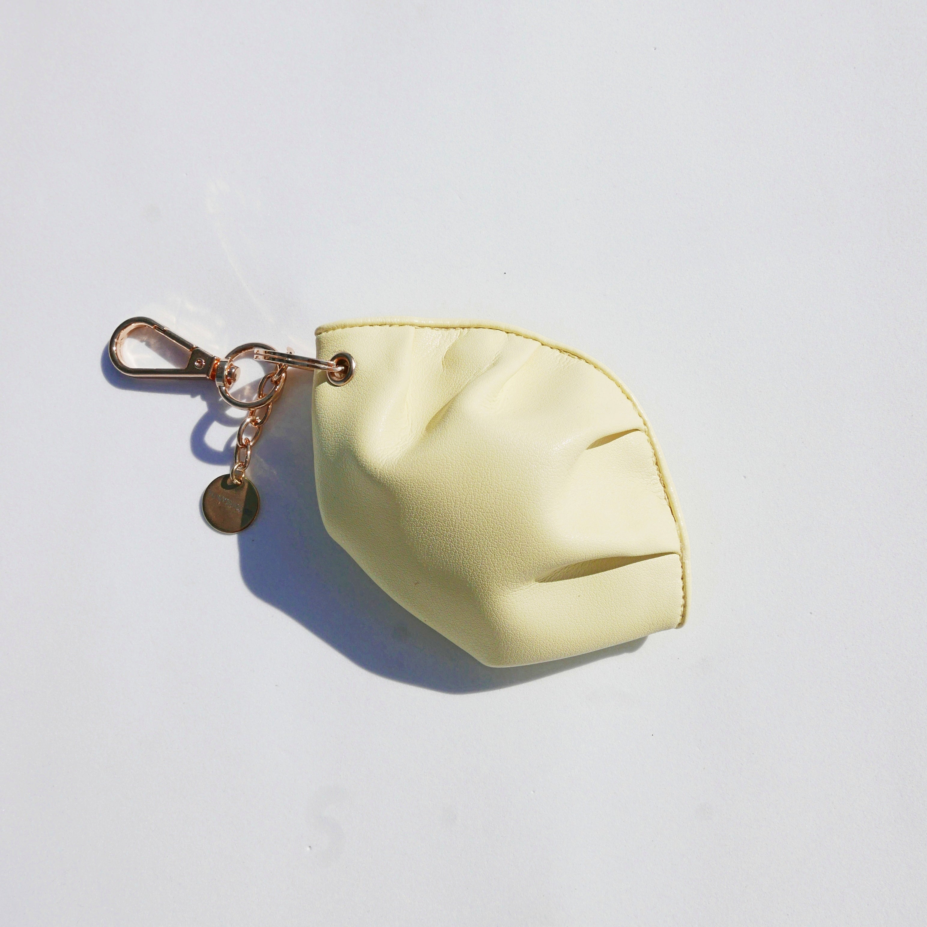 Llavero de gyoza de piel de vacuno amarillo