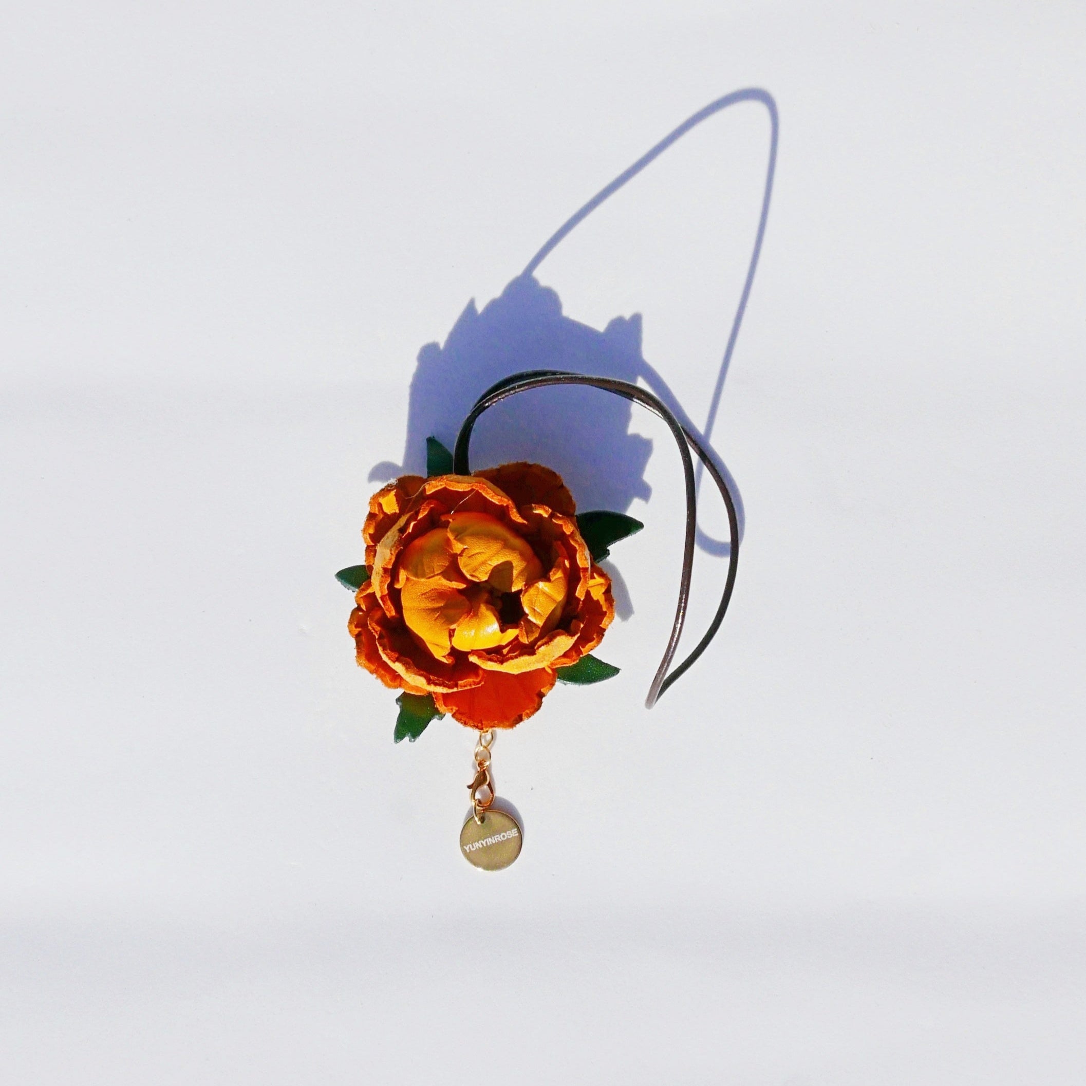 Charm de piel flore Mudan mostaza