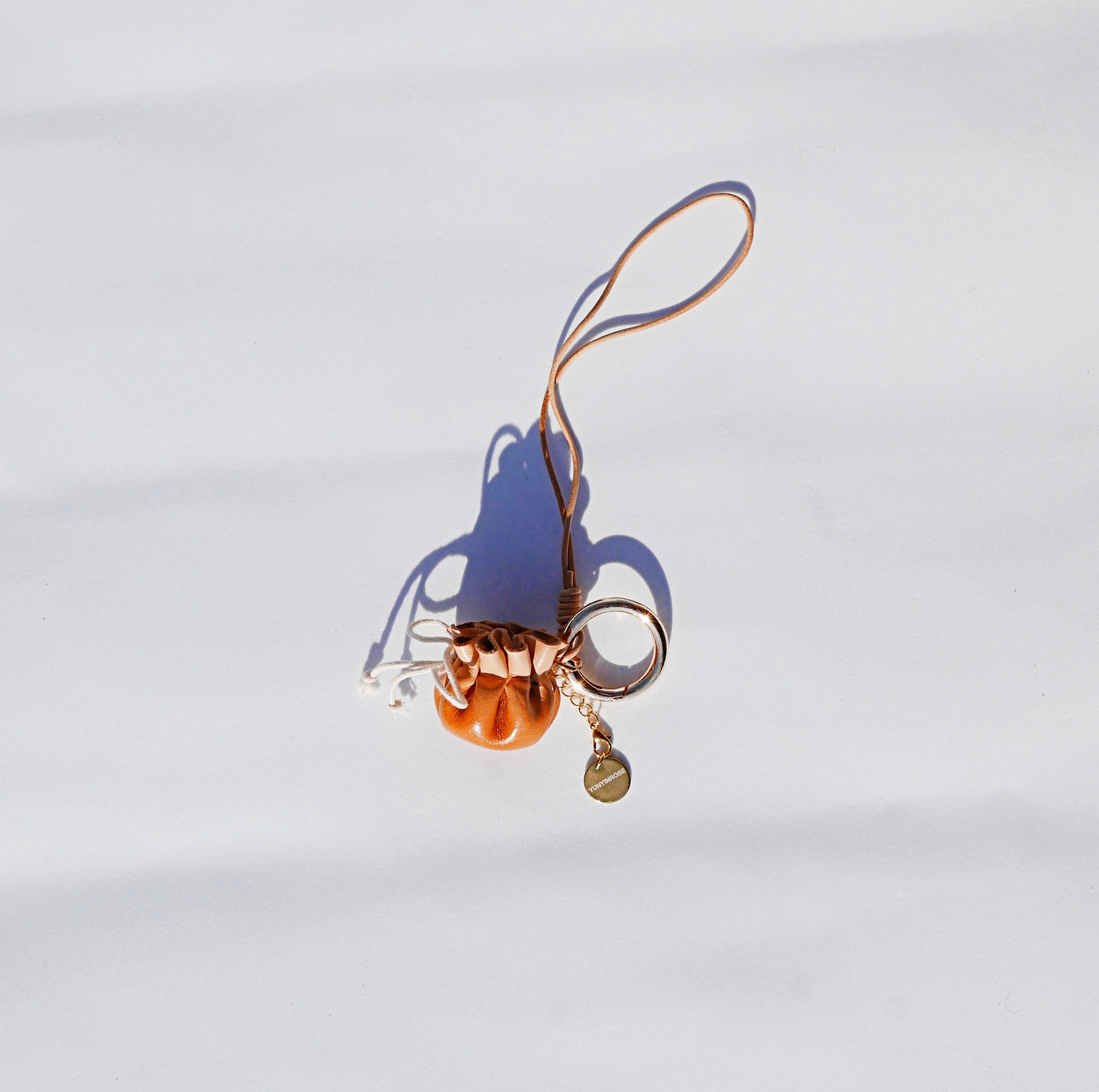 Charm de piel DimSum caramelo