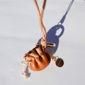 Charm de piel DimSum caramelo