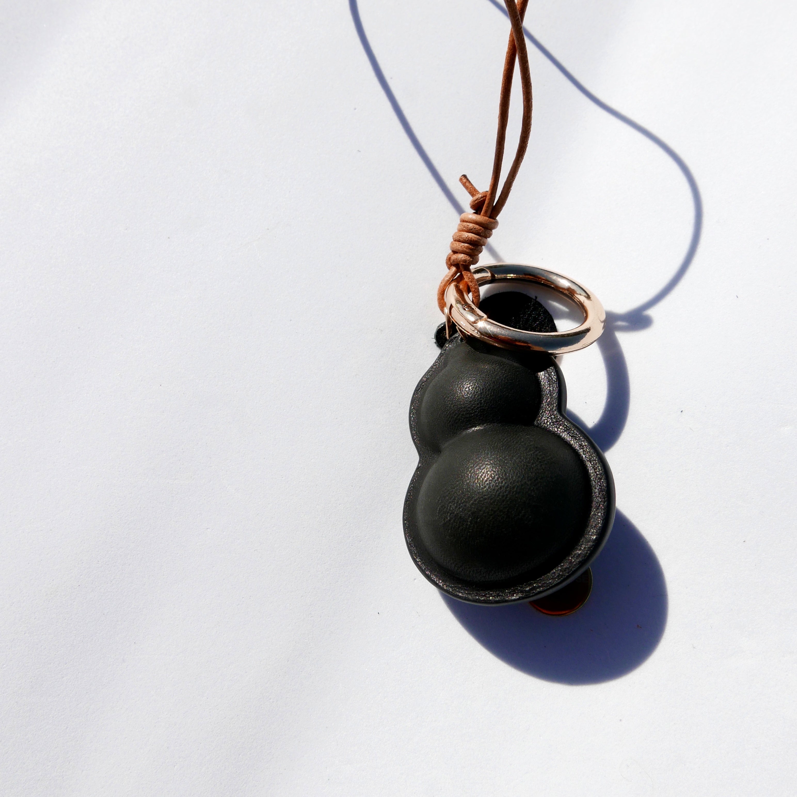 Charm de piel Hulu negro (calabaza china)