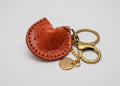 Charm de piel Galleta de la Fortuna naranja