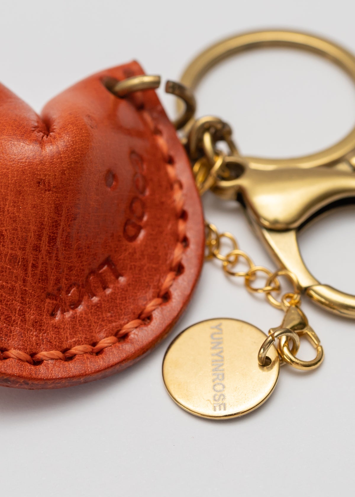 Charm de piel Galleta de la Fortuna naranja