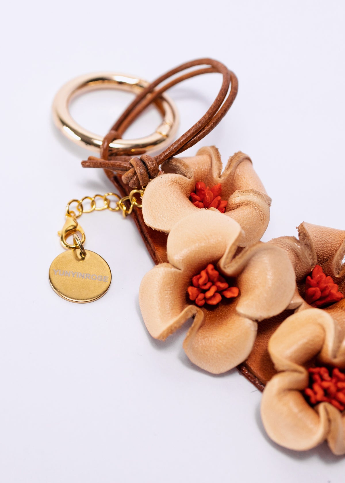 Charm de piel flore de Guihua caramelo