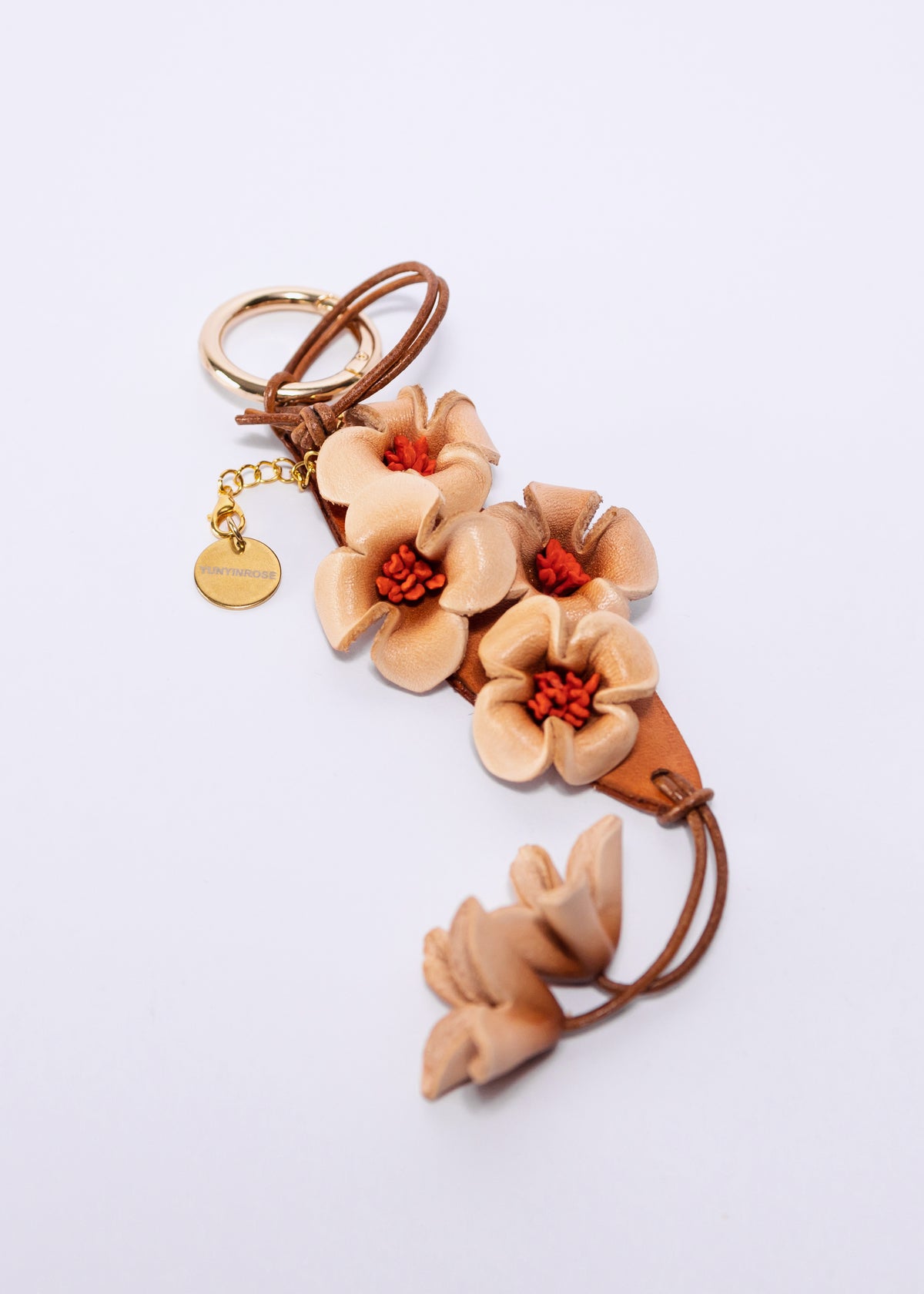 Charm de piel flore de Guihua caramelo
