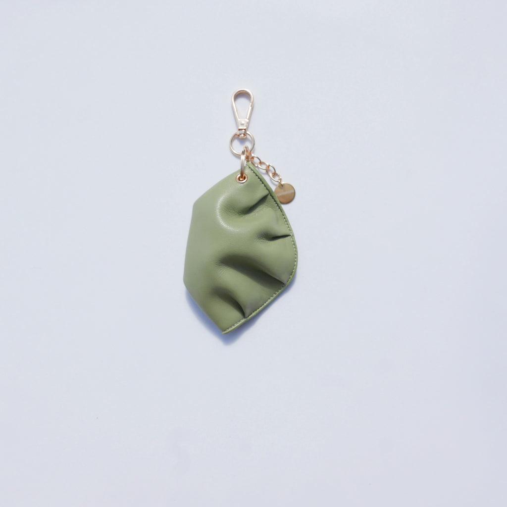 Llavero de gyoza de piel de vacuno verde