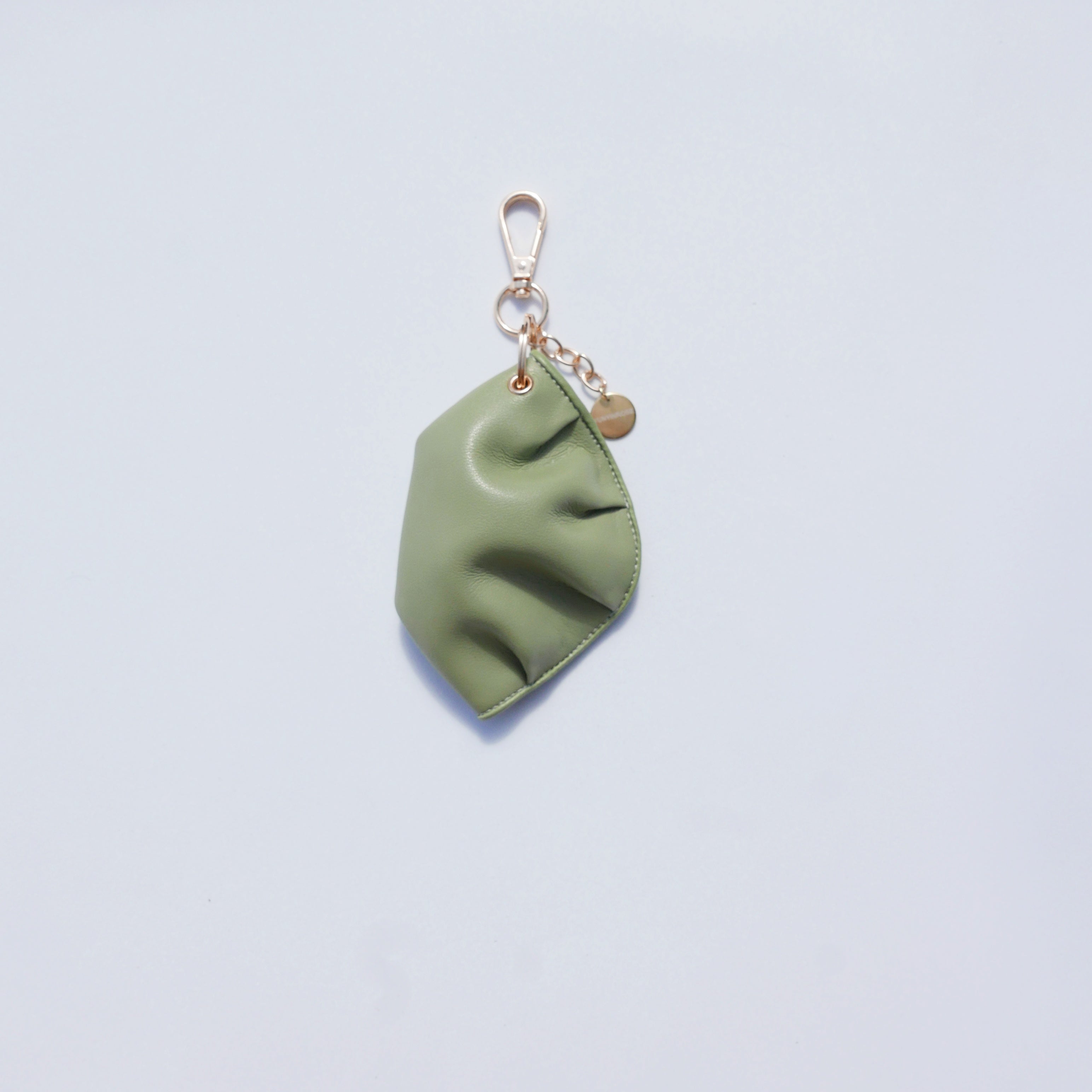 Llavero de gyoza de piel de vacuno verde